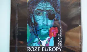 Okładka płyty "Róże Europy" z portretem w stylu pop-art, z różą w ustach i napisem "POGANIE! KOCHAJ i OBRAŻAJ".