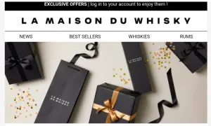Eleganckie czarne opakowania z logo "La Maison du Whisky" i złotymi wstążkami, otoczone konfetti. Idealne na prezent dla miłośnika whisky.