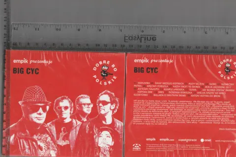 Okładka płyty zespołu Big Cyc. Na czerwonym tle wizerunki muzyków. Tekst: "empik prezentuje BIG CYC". "Facet to świnia" to jeden z utworów.