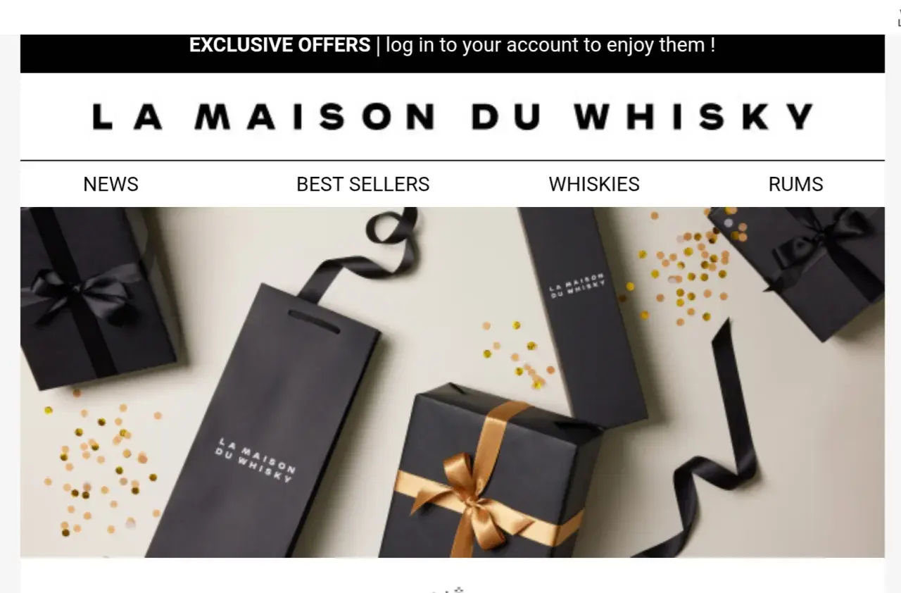 Eleganckie czarne opakowania z logo "La Maison du Whisky" i złotymi wstążkami, otoczone konfetti. Idealne na prezent dla miłośnika whisky.